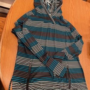 Sport shirt title nine size large made of a nylon material